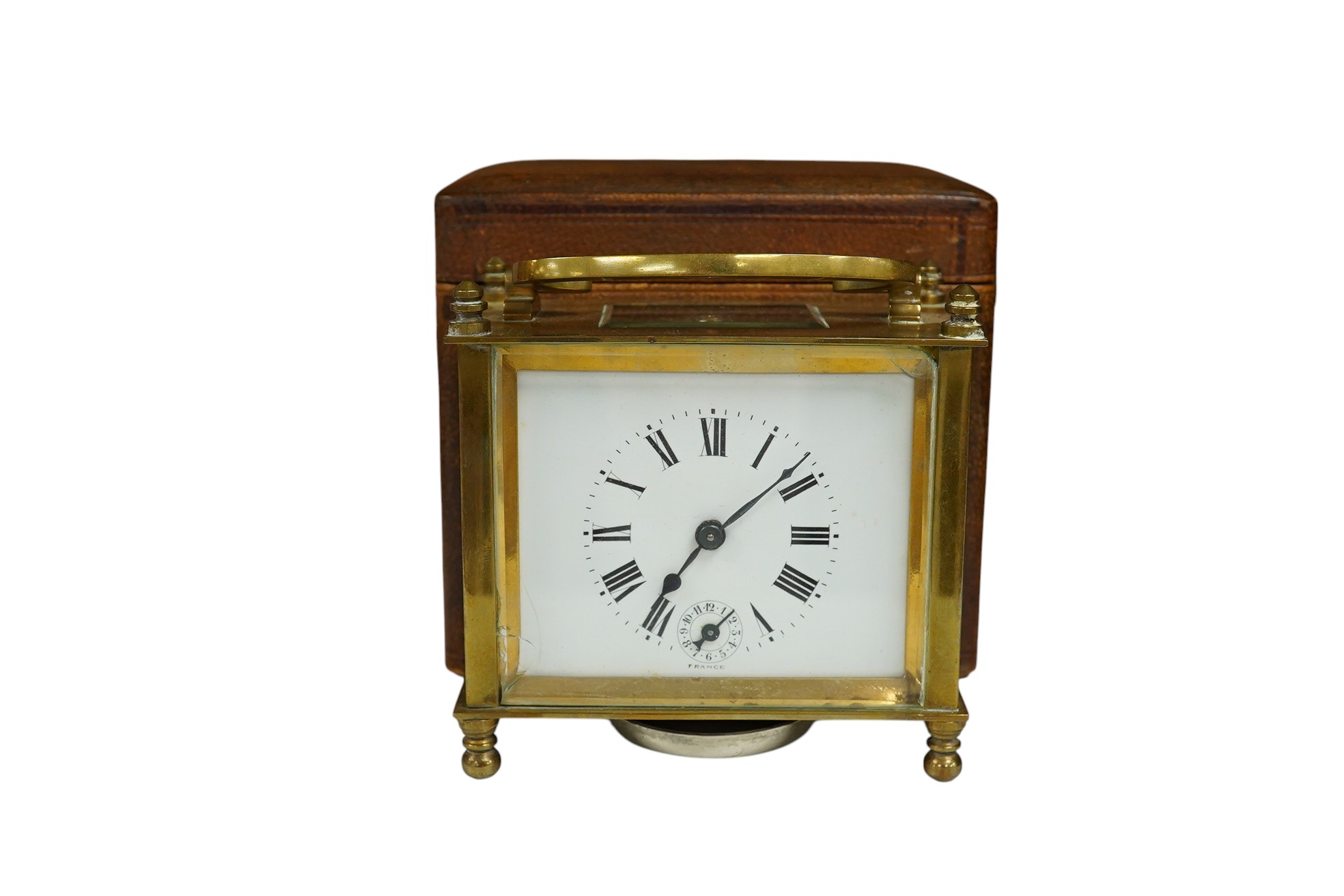 A cased French brass carriage timepiece with alarm, 12cm high